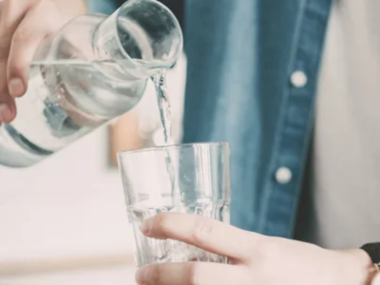 depositphotos_387239804-stock-photo-man-pours-himself-glass-clean