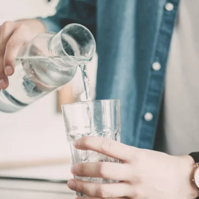 depositphotos_387239804-stock-photo-man-pours-himself-glass-clean