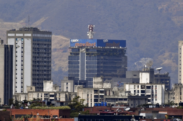 View of the state-owned telephone and internet company CANTV headquarters in Caracas, on March 10, 2019. Sunday is the third day Venezuelans remain without communications, electricity or water, in an unprecedented power outage that already left 15 patients dead and threatens with extending indefinitely, increasing distress for the severe political and economic crisis hitting the oil-rich South American nation. (Photo by YURI CORTEZ / AFP)