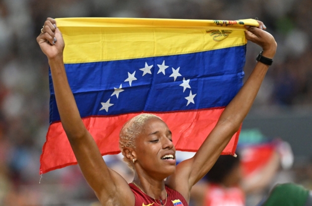 Budapest (Hungary), 25/08/2023.- Yulimar Rojas of Venezuela celebrates her victory after the final of women's triple jump of the World Athletics Championships in the National Athletics Centre in Budapest, Hungary, 25 August 2023. (Mundial de Atletismo, Triple salto, Hungría) EFE/EPA/Zsolt Czegledi HUNGARY OUT