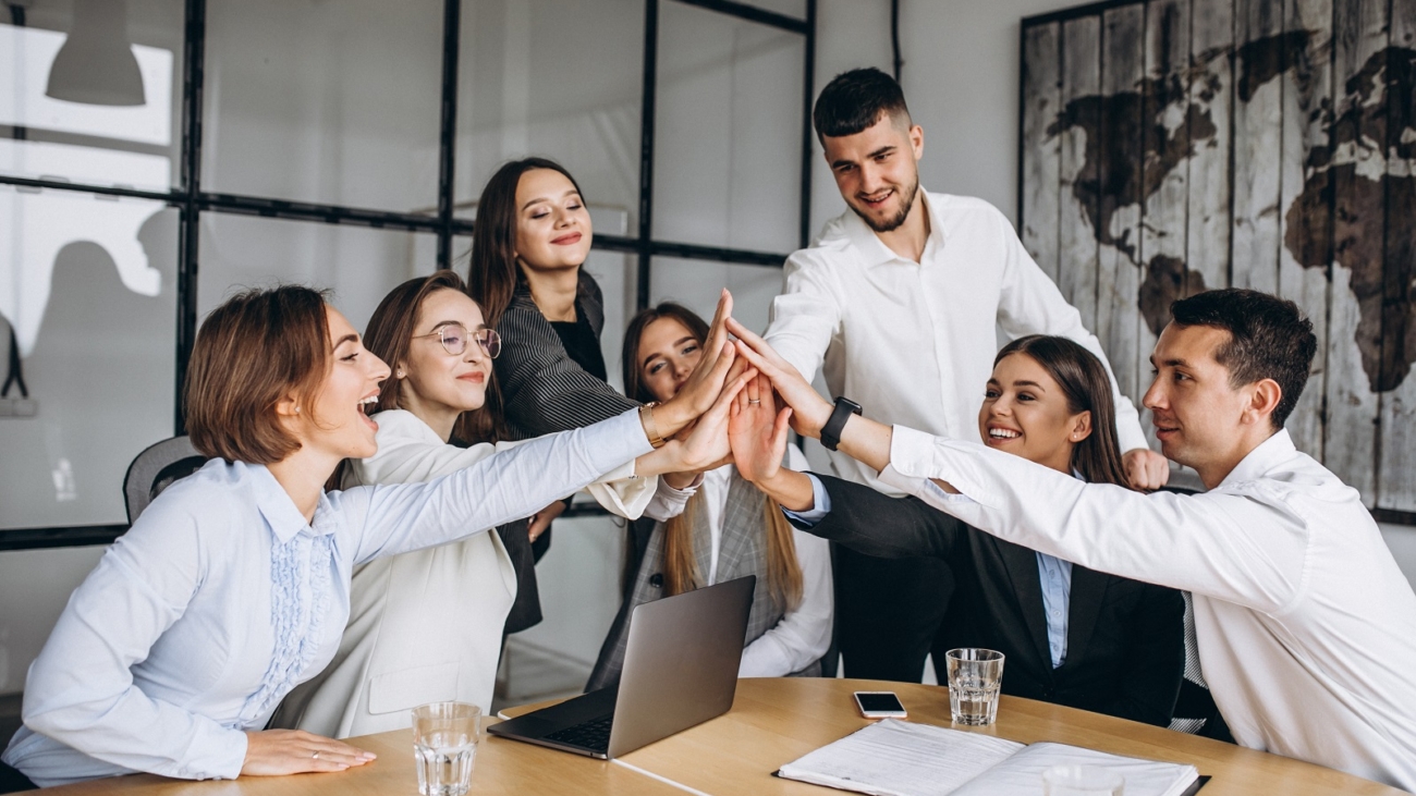 Group of people working out business plan in an office