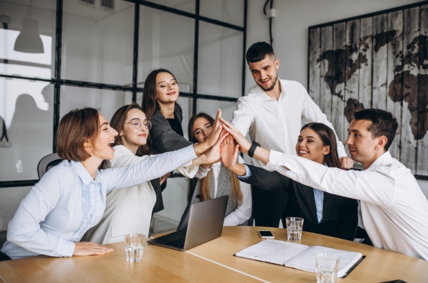 Group of people working out business plan in an office