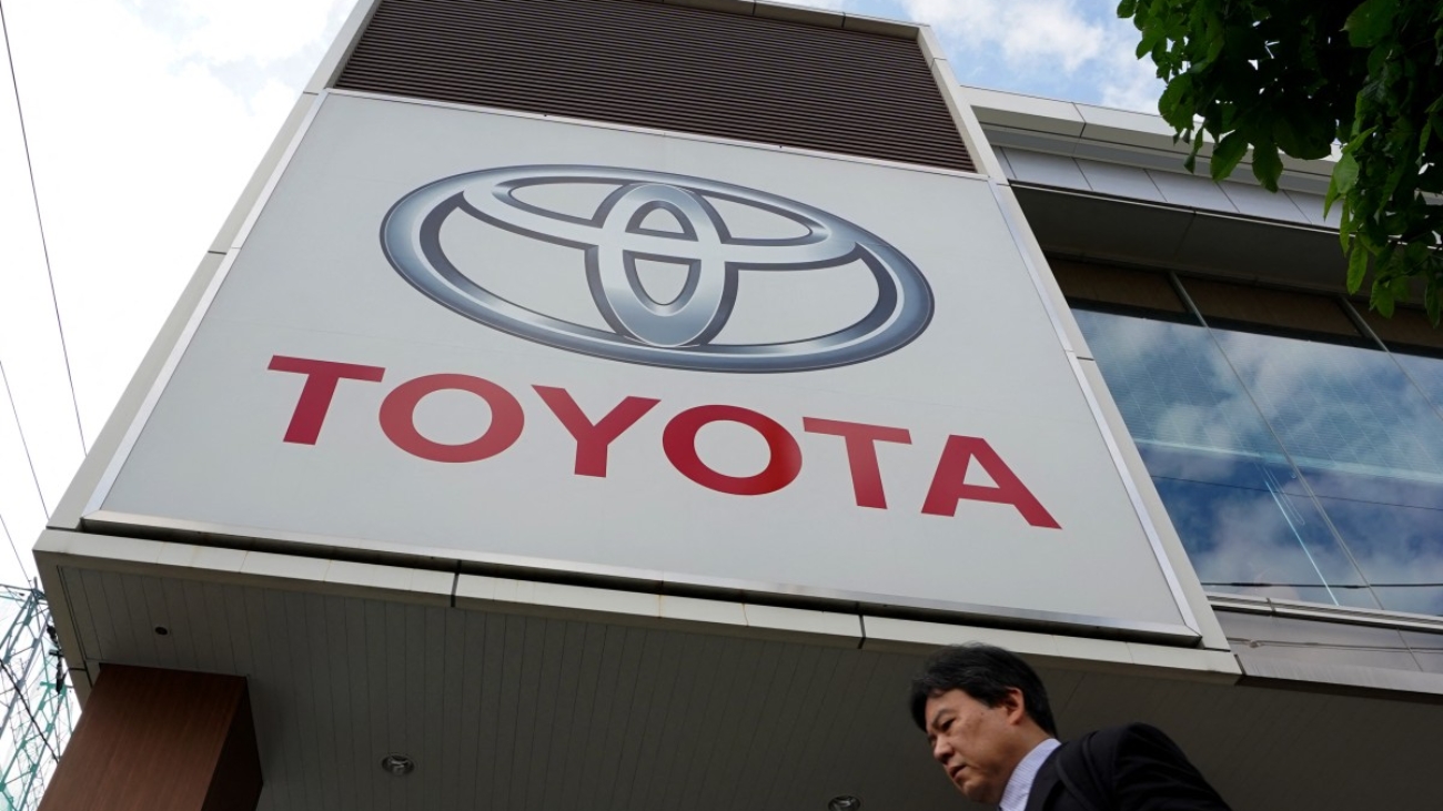 The logo of Toyota Motor is displayed at a car showroom in Tokyo on May 8, 2025. (Photo by Kazuhiro NOGI / AFP)