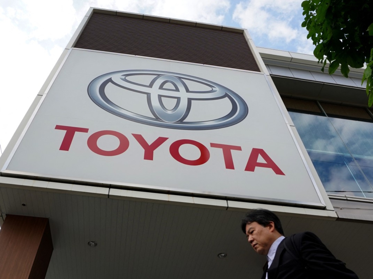 The logo of Toyota Motor is displayed at a car showroom in Tokyo on May 8, 2025. (Photo by Kazuhiro NOGI / AFP)