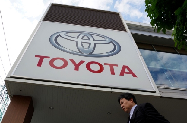 The logo of Toyota Motor is displayed at a car showroom in Tokyo on May 8, 2025. (Photo by Kazuhiro NOGI / AFP)