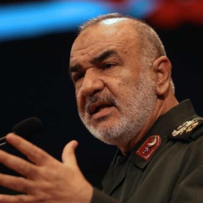 FILE - In this Nov. 22, 2018 file photo, the then-deputy commander of Iran's Revolutionary Guard Gen. Hossein Salami speaks during a conference in Tehran, Iran. Salami declared on March 5, 2020 that Iran is currently engaged in a fight against a virus which might be the product of an American biological attack. (AP Photo/Vahid Salemi, File)