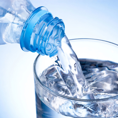 bottled-water-poured-glass-37392749