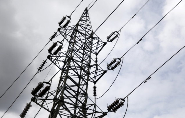 A high-voltage tower is pictured at the Waraira Repano hill, also known as "El Avila," in Caracas on August 31, 2024. Power was restored across Venezuela on Saturday morning, after a massive 12-hour outage plunged the entire country into darkness. The government has blamed the outage on "sabotage" by opposition forces protesting what they say was fraud in the widely disputed elections that left President Nicolas Maduro in charge. (Photo by Pedro Rances Mattey / AFP)